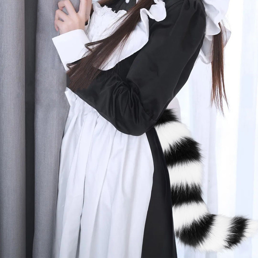 Femboy in sexy striped cat tail cosplay