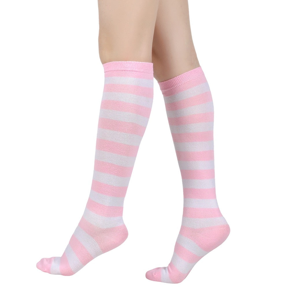 Pink and gray femboy striped knee-high socks on a white background