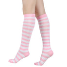 Pink and white femboy pin striped knee-high socks on a white background