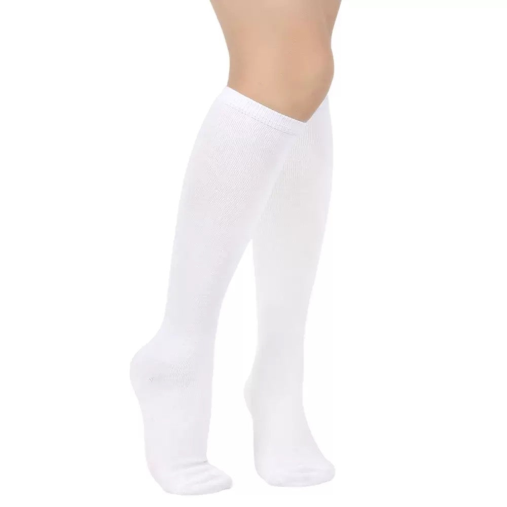 White knee-high socks on a white background