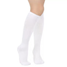 White knee-high socks on a white background