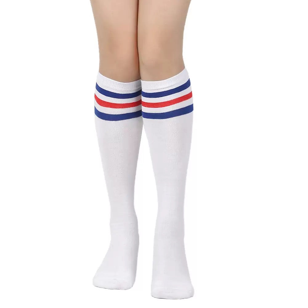 White knee-high socks with red and blue stripes on a white background