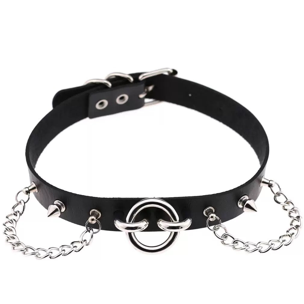 Black leather choker with silver chains and spikes on a white background