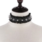 Black choker with studs on a mannequin head