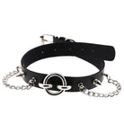 Black leather choker with silver chain and rings on a white background