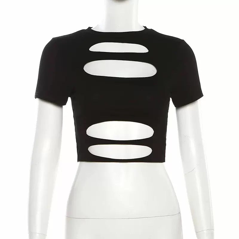 Black crop top with cut-out design on a mannequin against a white background