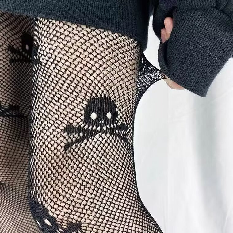 Gothic skull fishnet pantyhose detail