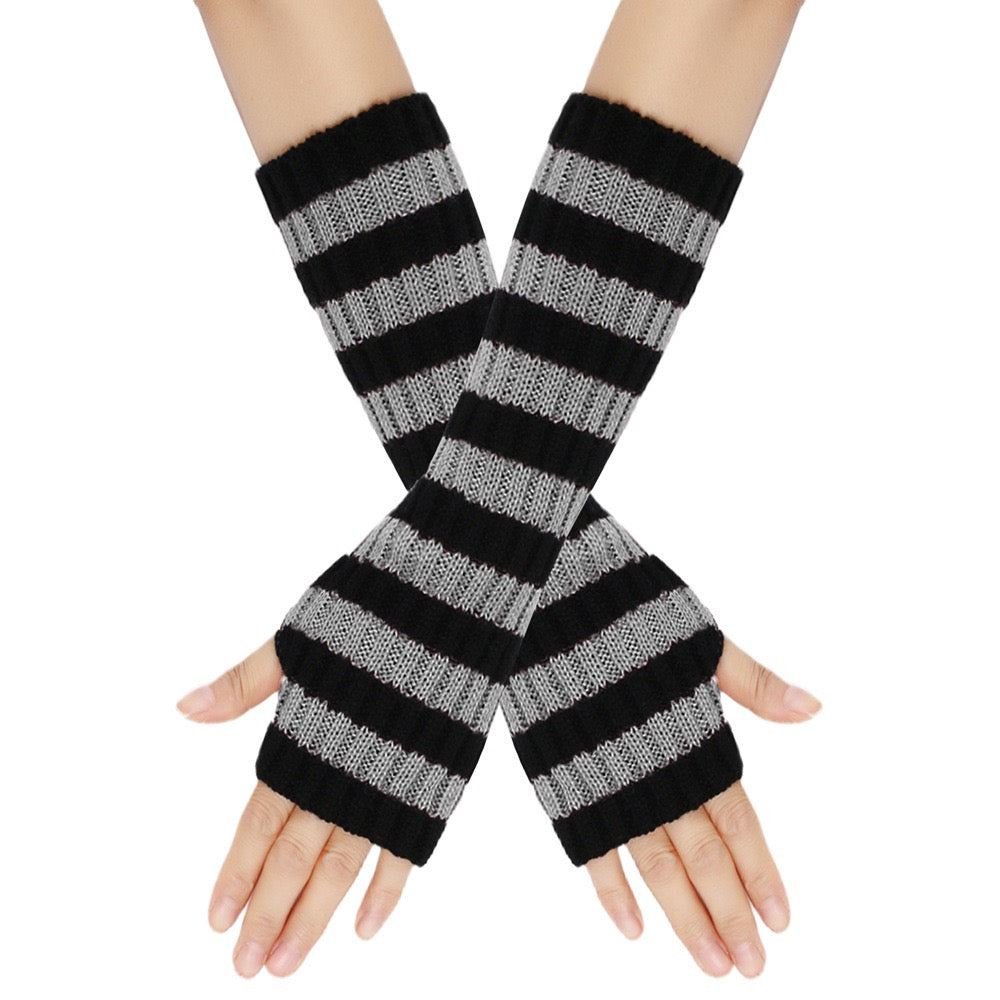 Black and gray striped arm warmers on a white background