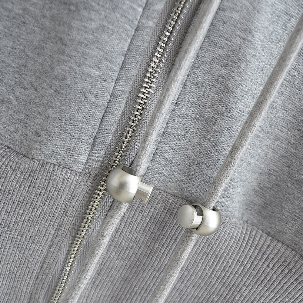 Gray zippered hoodie with devil horns detail