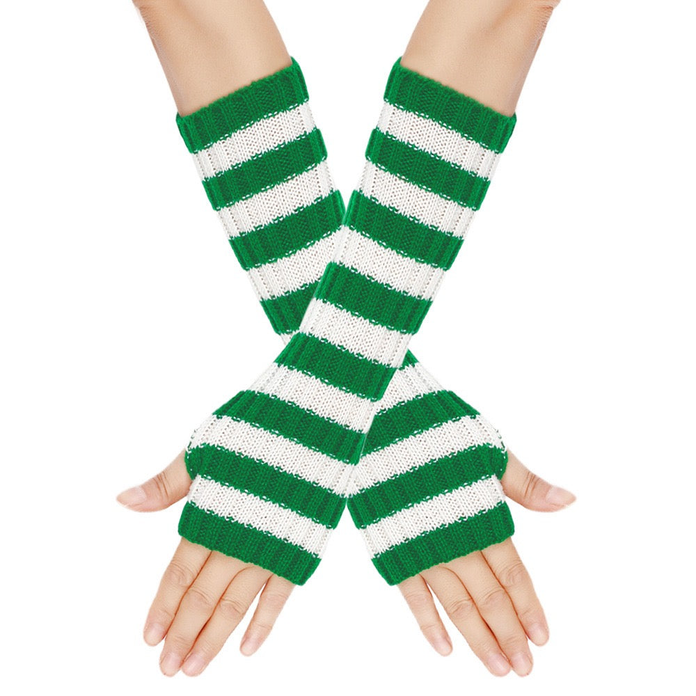 Green and white striped arm warmers on a person's arms with a white background
