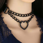 Black chain necklace with heart-shaped clasp on a mannequin