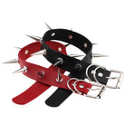 Black and red leather chokers with spikes on a white background