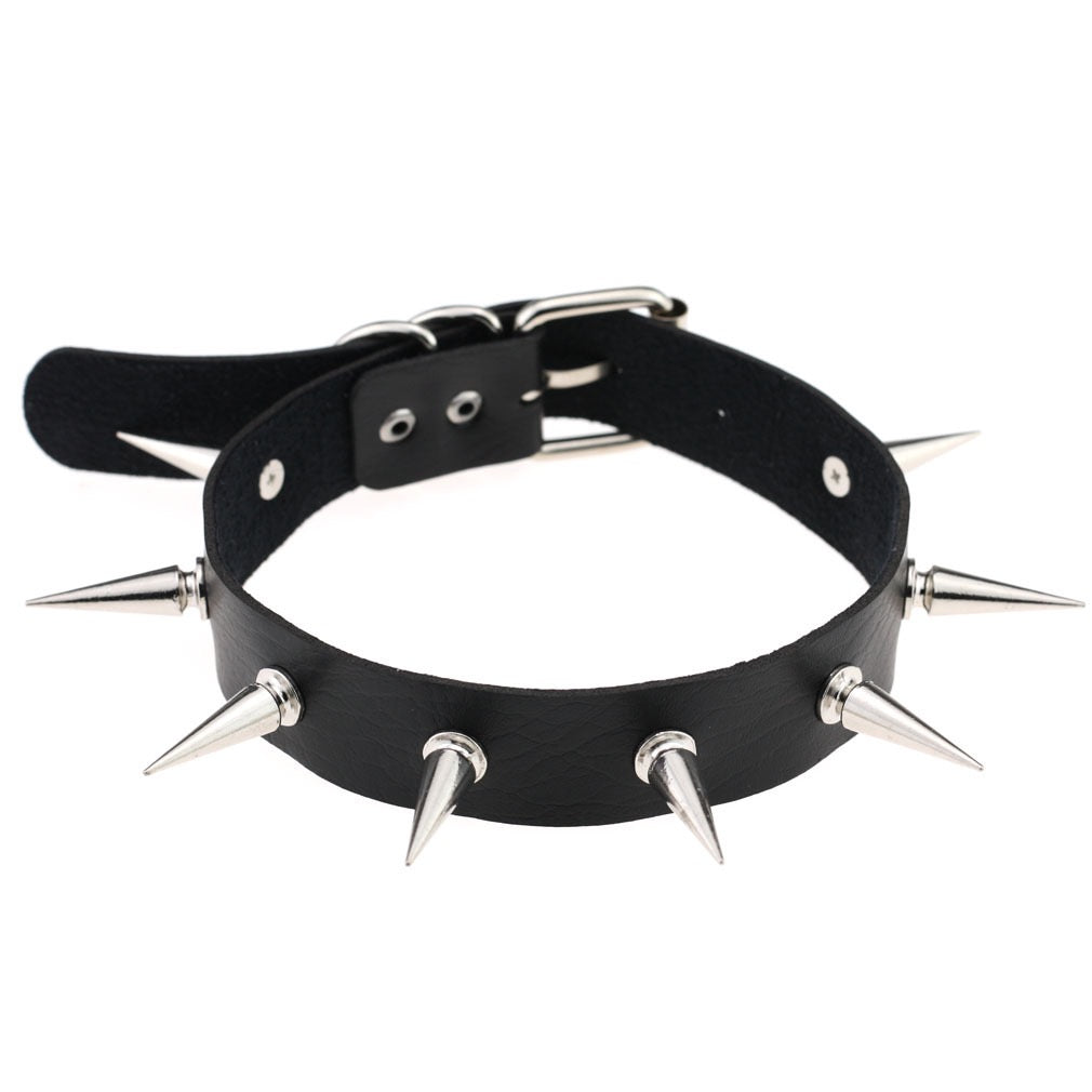 Black leather choker with silver spikes on a white background