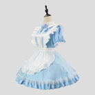 Light blue dress with white lace details on a mannequin against a gray background