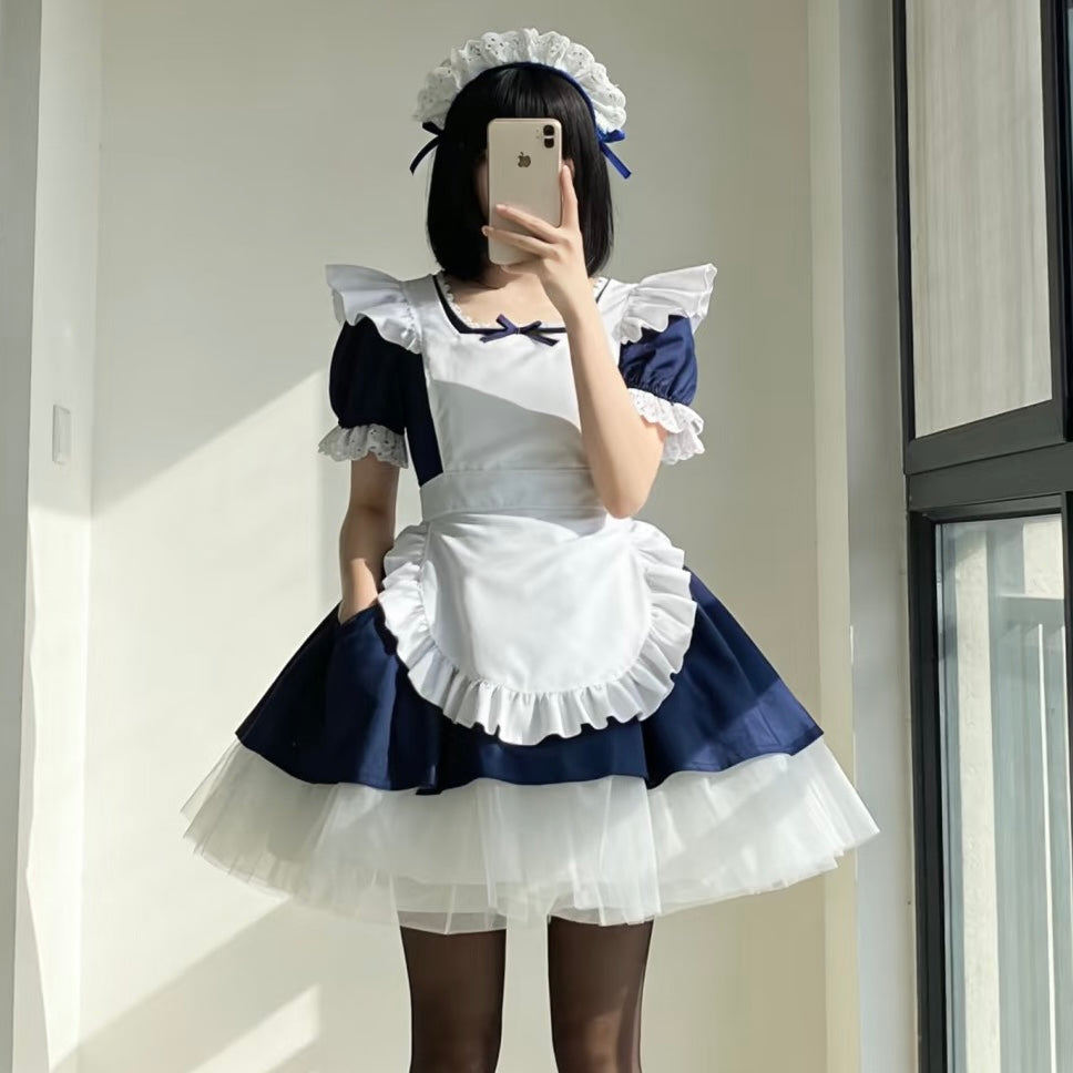 Femboy in a navy cosplay lolita maid dress