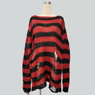 Red and black oversized striped distressed ripped sweater