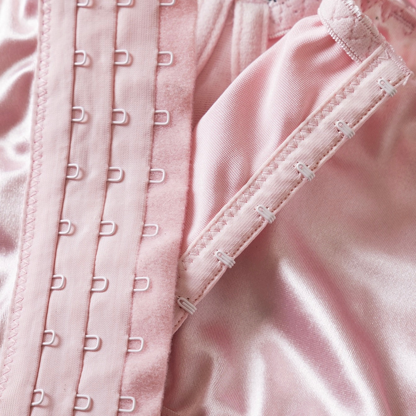 Close-up of a pink garment with lace details