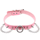 Pink choker with chain and spikes on a white background