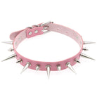 Pink leather choker with silver spikes on a white background