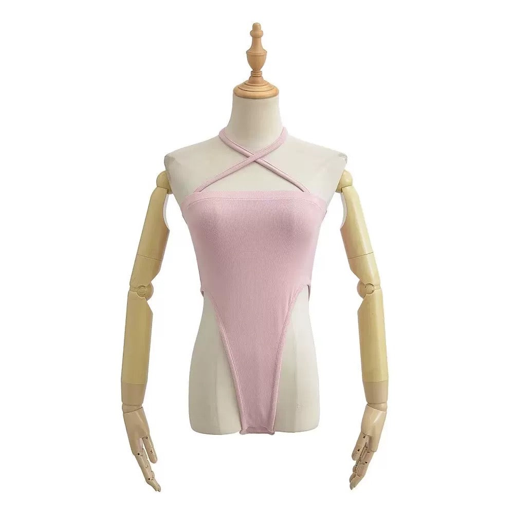 Mannequin wearing a pink and beige sleeveless top on a white background