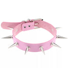 Pink choker with silver spikes on a white background