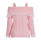 A pink ribbed knit cold-shoulder sweater with white lace trim across the neckline and cuffs, displayed on a solid white background.