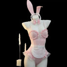 Bunny costume with pink lingerie and rabbit ears on a mannequin against a black background.