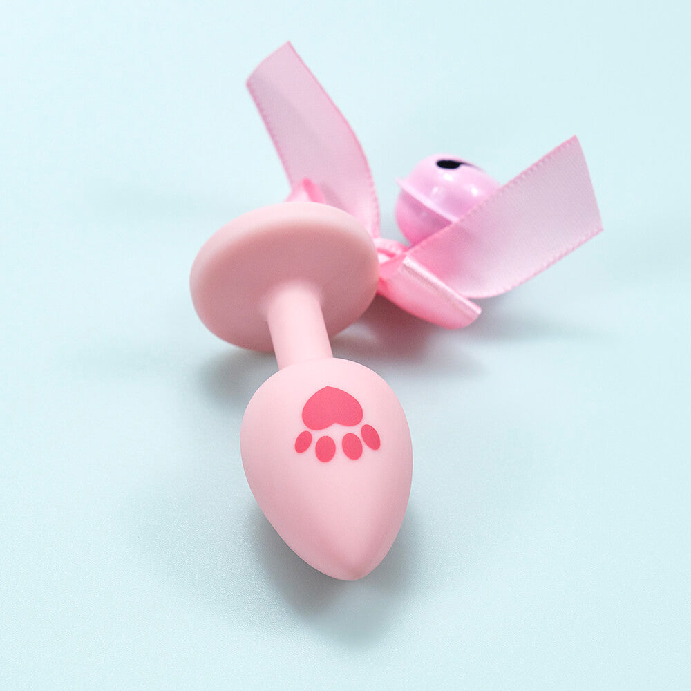 Pink silicone cat paw butt plug with bell