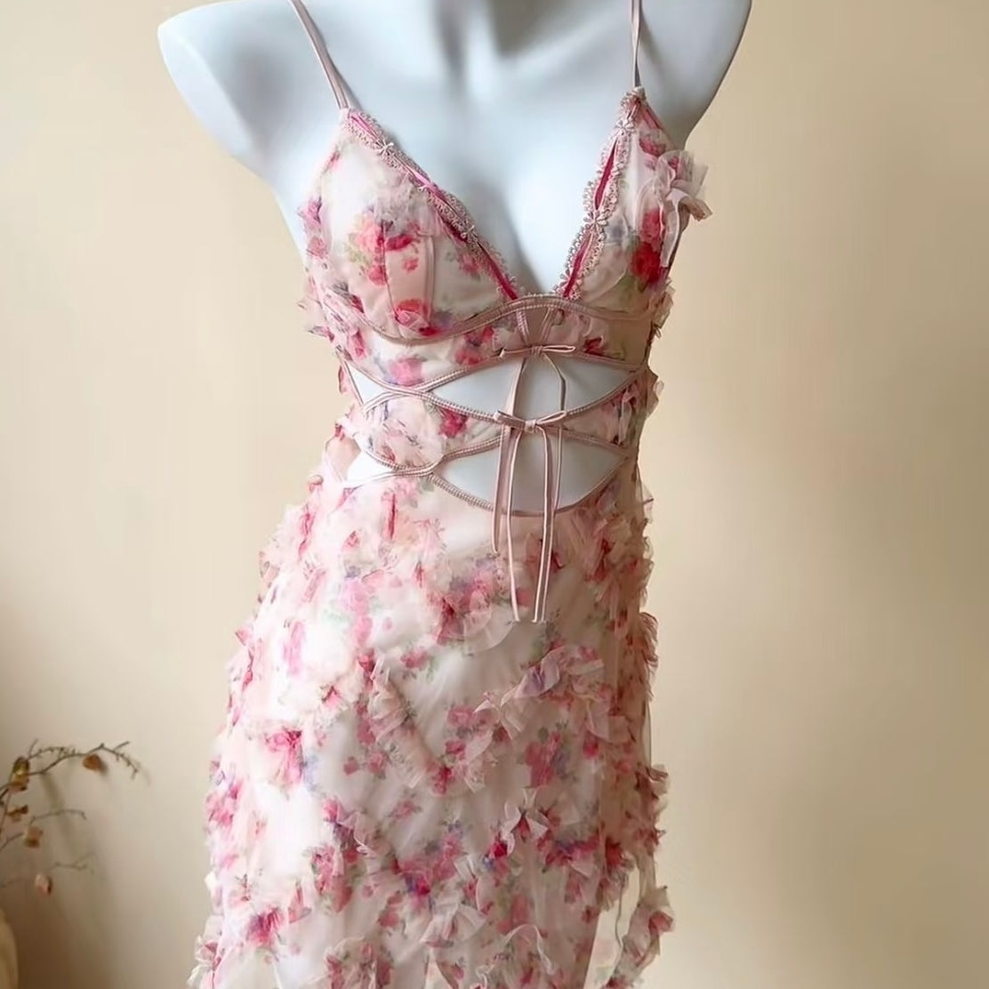 Floral sweet lace camisole nightgown on a mannequin against a plain background