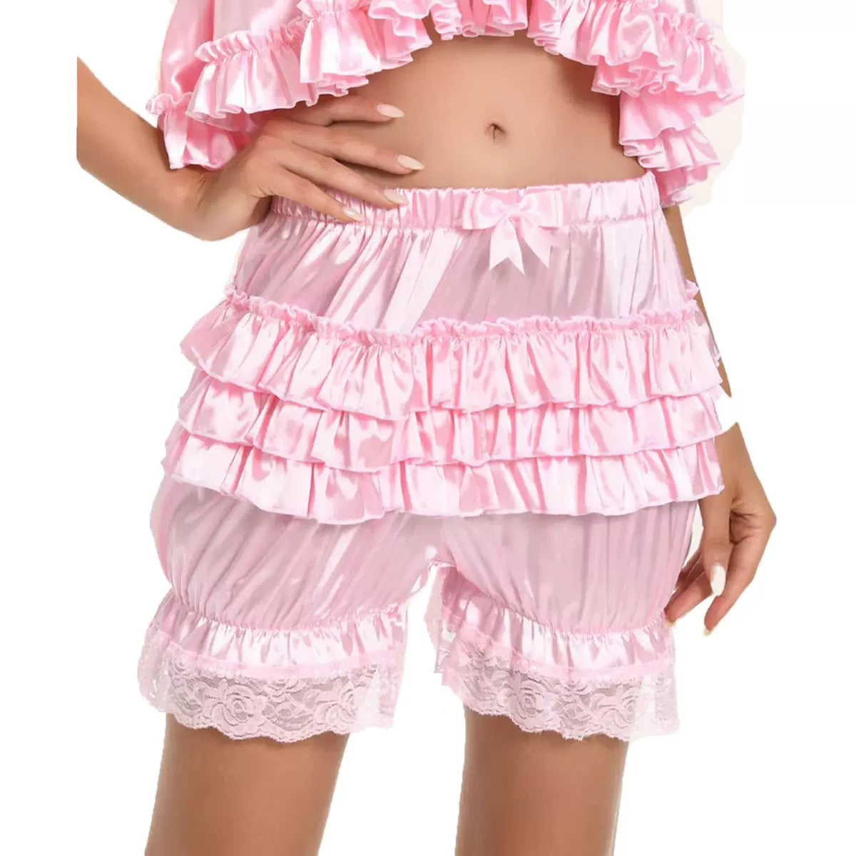 Pink sweet ruffled bloomer short with lace details on a white background