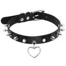 Black leather choker with silver spikes and a heart-shaped pendant on a white background