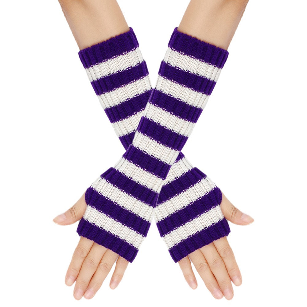 Purple and white striped arm warmers on a person's hands against a white background