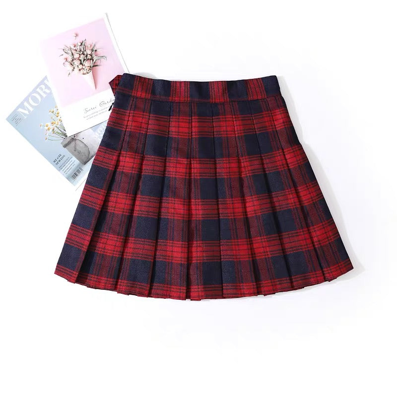 Red and black plaid skirt on a white background