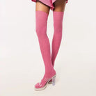 Rose thigh-high socks with clear platform shoes on a white background