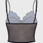 Gray bra with lace trim and mesh back on a light gray background