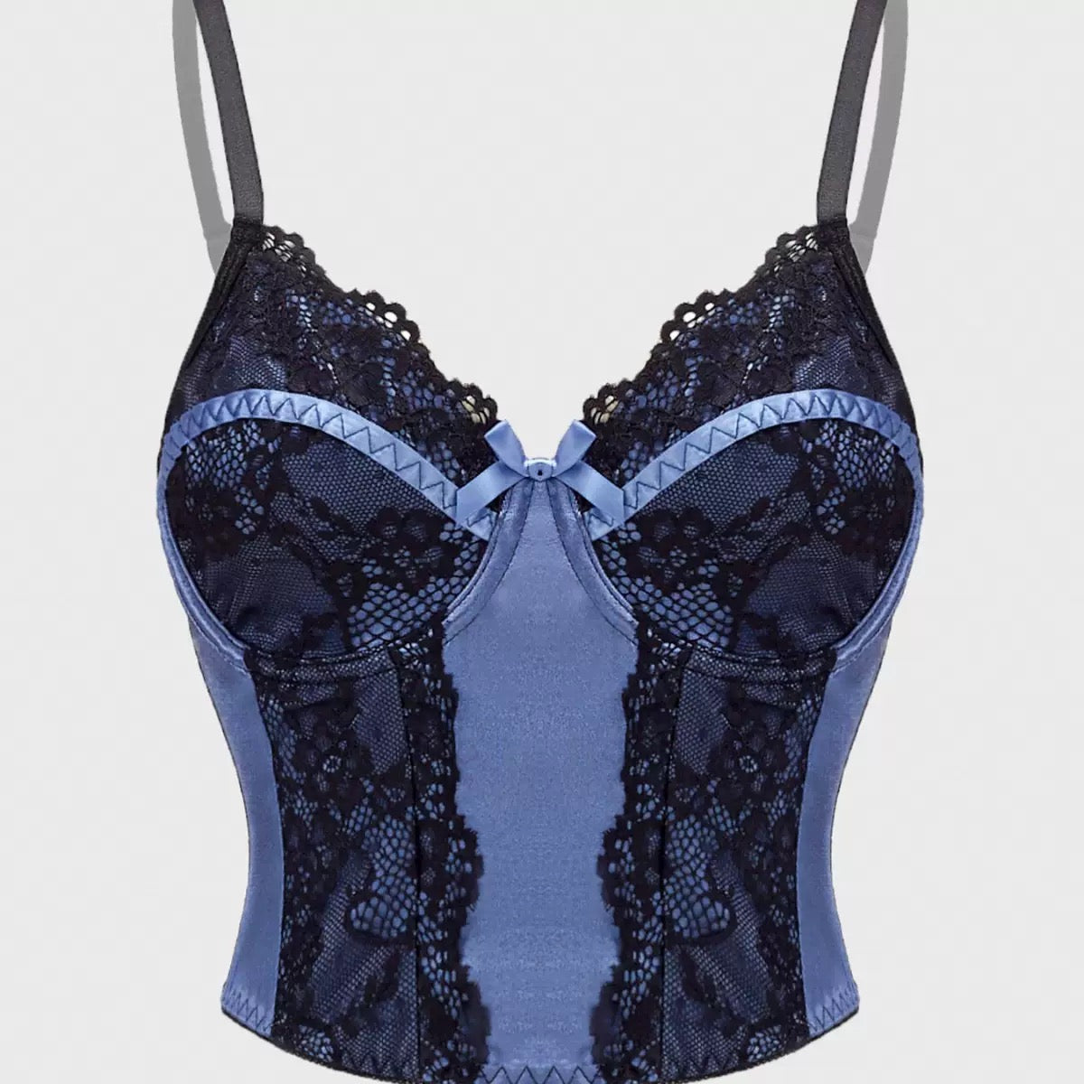 Blue lace camisole top on a light gray background
