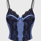 Blue lace camisole top on a light gray background