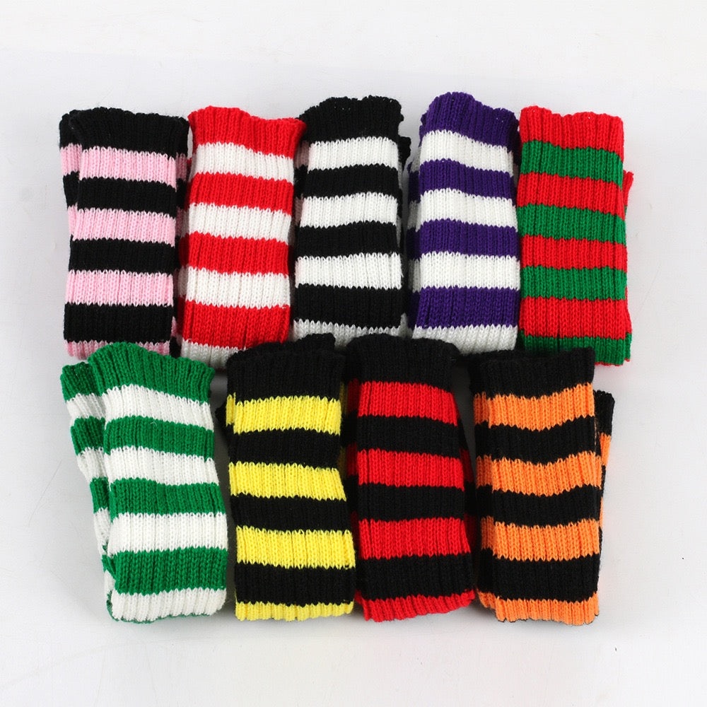 Colorful striped socks arranged in a grid on a white background