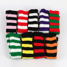 Colorful striped socks arranged in a grid on a white background