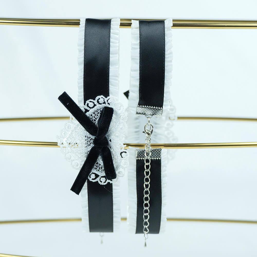 sweet lolita maid choker with black ribbons and decorative elements on a white background