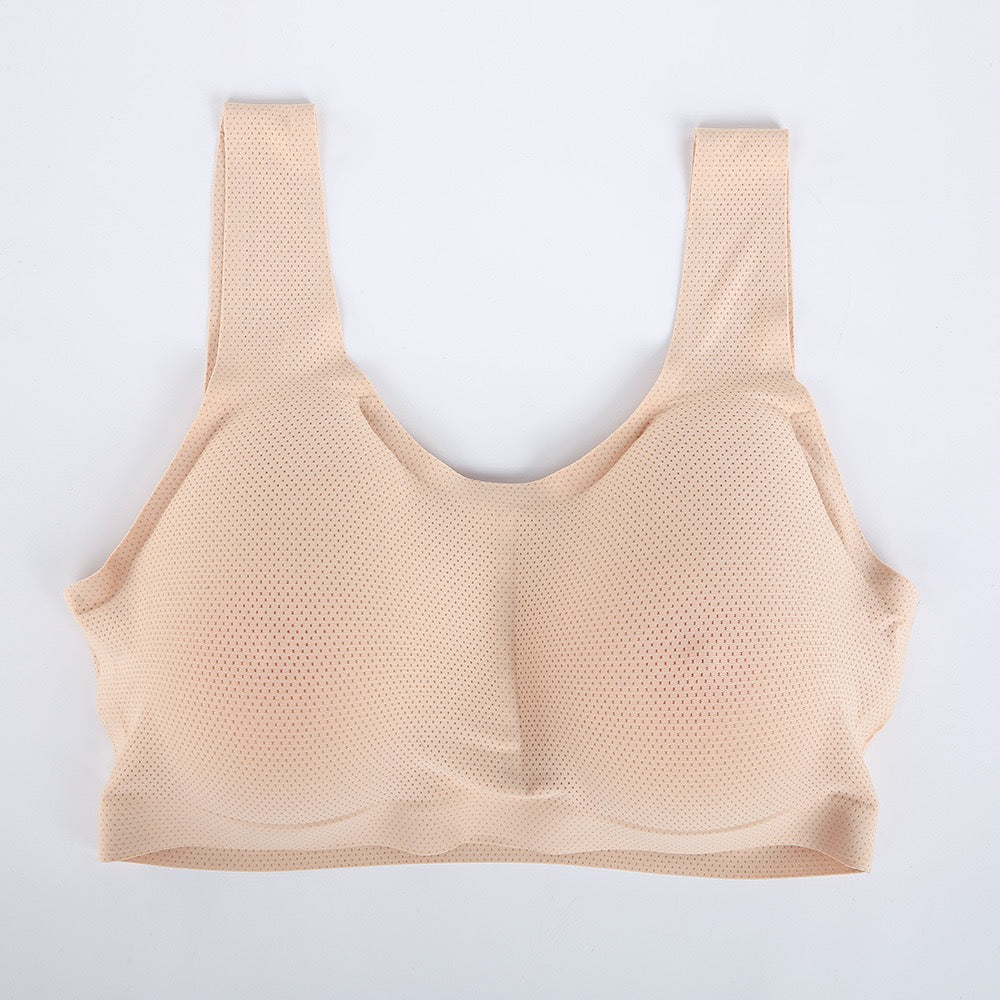 A beige seamless mesh underwire bra with wide shoulder straps, shown flat against a plain white background.