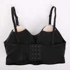 Black wireless underwire bra with adjustable shoulder straps and a central lace-up closure, displayed on a plain white background.