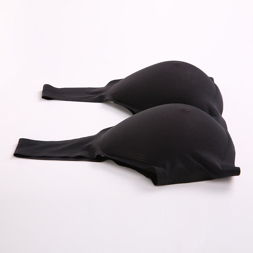 Black seamless underwire bra with wide shoulder straps, displayed on a clean white background.