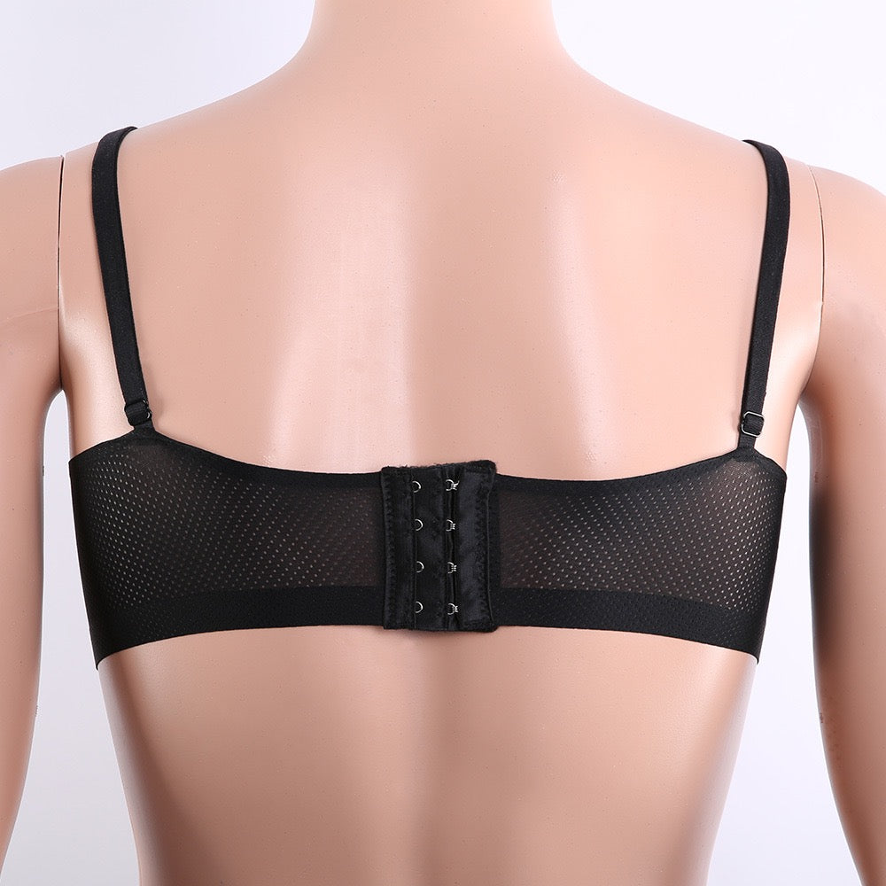Black mesh underwire bra shown from the back on a beige mannequin torso against a white background.