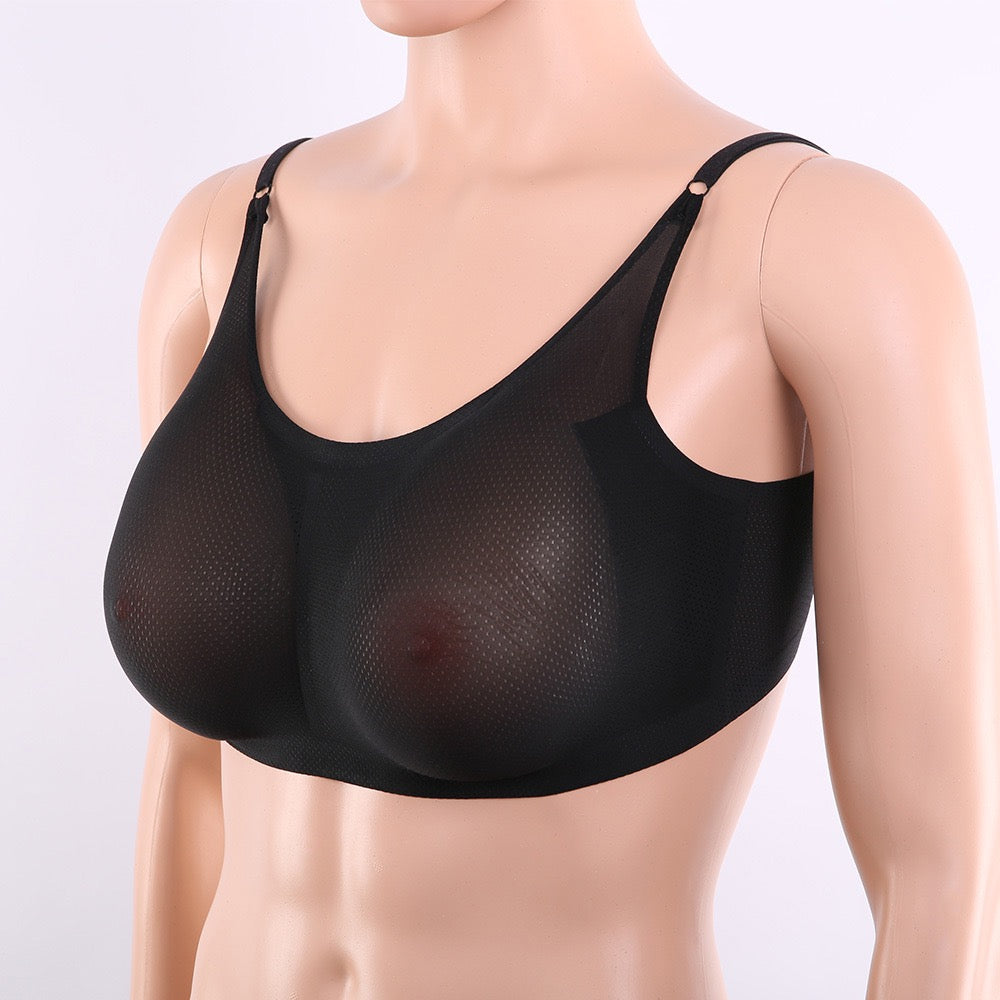 Teardrop silicone breast forms with black bra cupped underside side