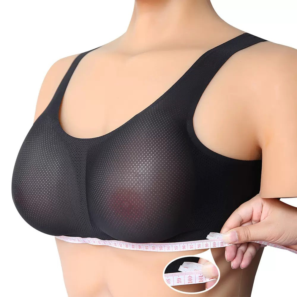 A close-up of a person wearing a black mesh underwire bra while measuring the band with a tape measure. A circular inset shows the tape measure in detail.