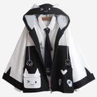 Black and white jacket with cat-themed designs on a white background