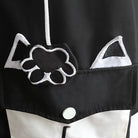 Black and white hoodie with cat ears and a knuckle design on a dark background