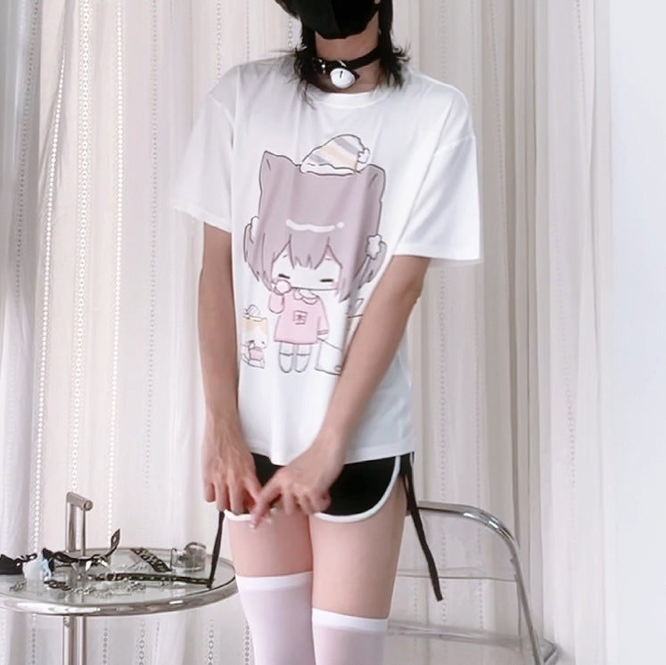 Person wearing a white t-shirt with a graphic design in a minimal indoor setting