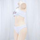 White bikini set on a mannequin against a white background